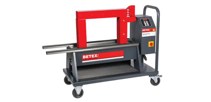 Industrial sheet-metal bending/press brake on a wheeled stand with red frame and control panel on the right, Betex branding visible.