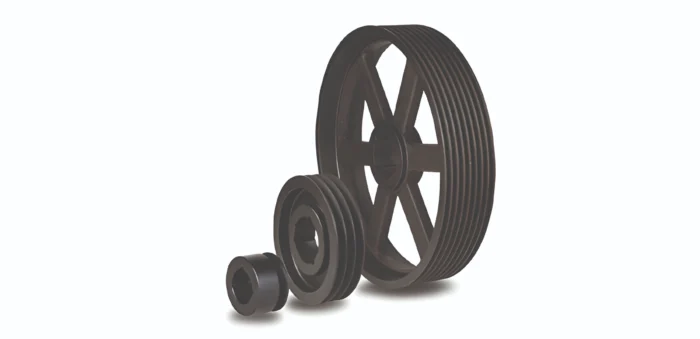 Large multi-groove pulley with a belt and two smaller pulleys on a white background (industrial belt drive).