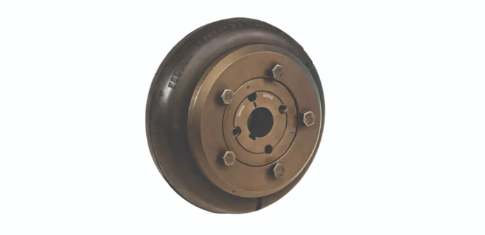 Brake drum with five lug studs mounting a wheel hub, viewed at an angle