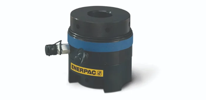 Close-up of an Enerpac hydraulic cylinder head with a knurled black cap and blue sealing band