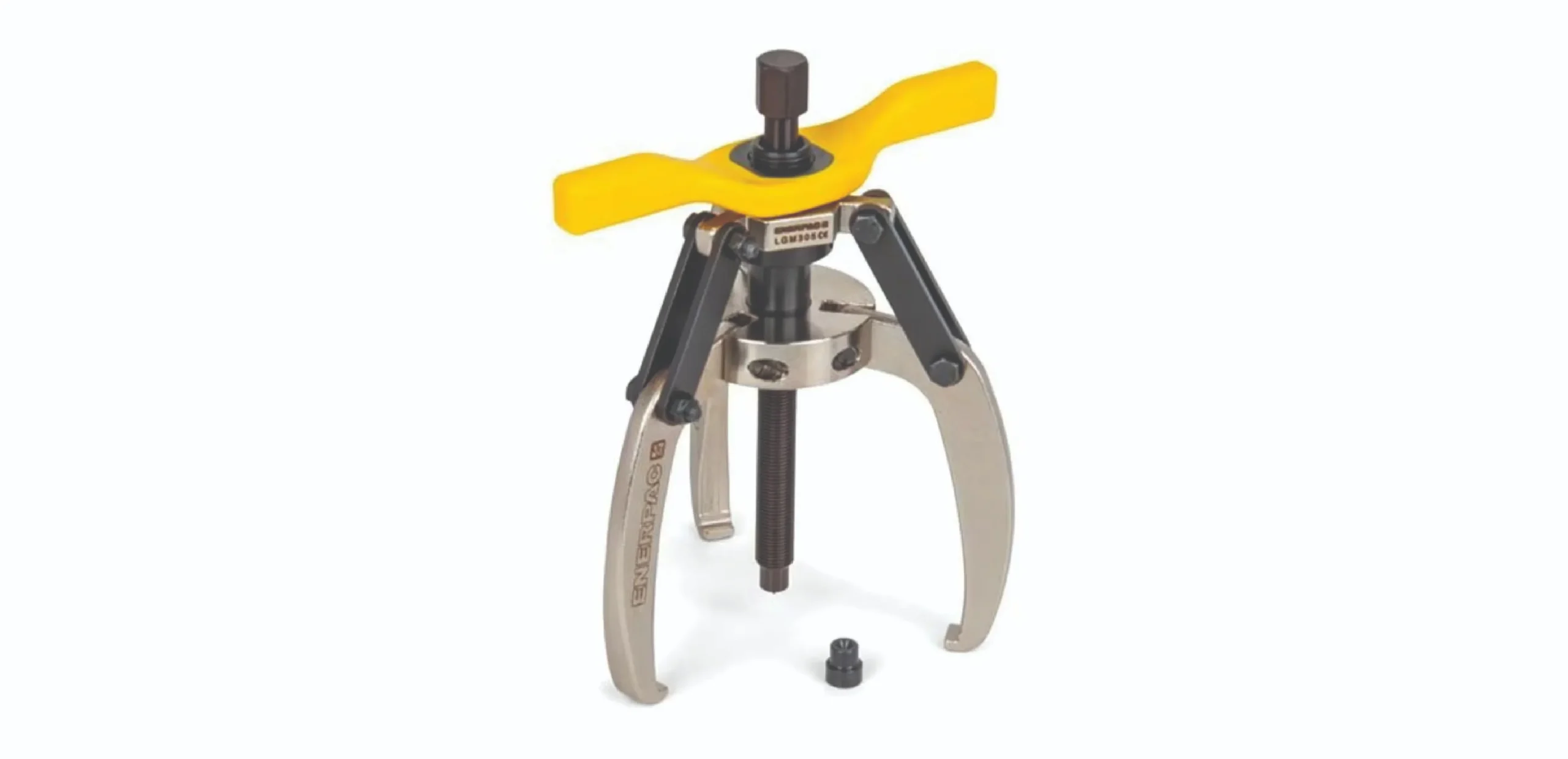 Three-arm gear puller with a yellow cross-shaped handle and central screw for removing gears or bearings (industrial tool)