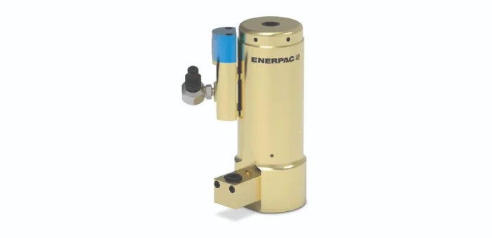 Enerpac hydraulic cylinder with a blue top and mounted control valve on a beige base.