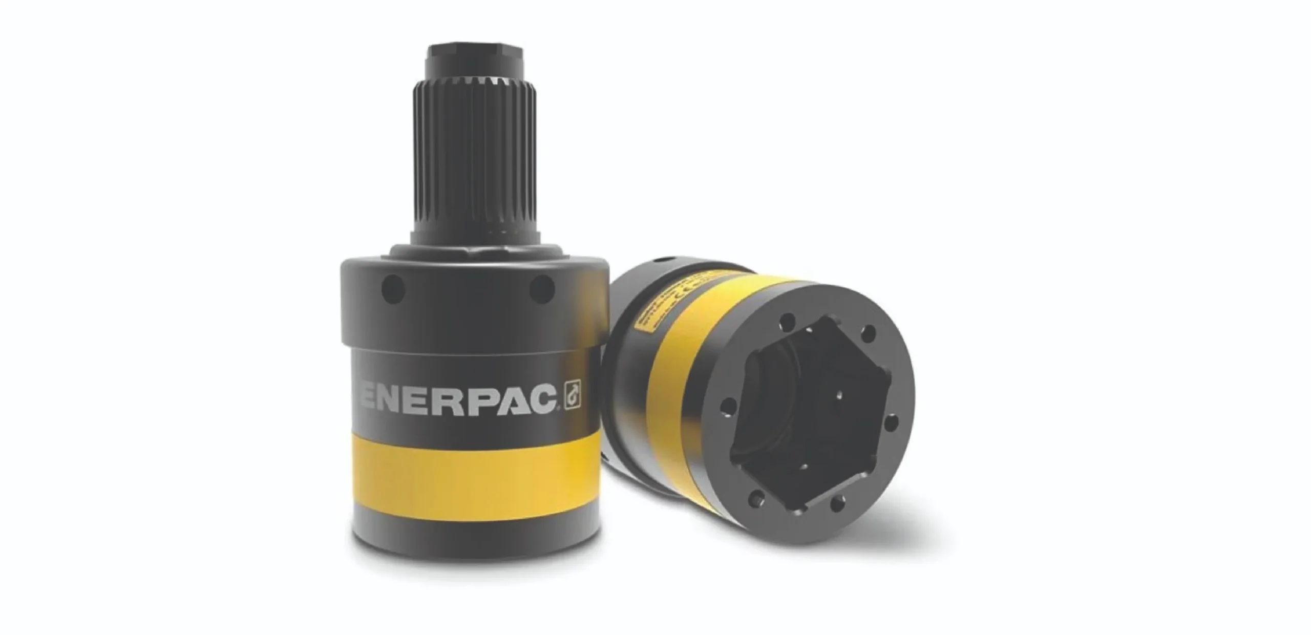 Enerpac hydraulic pump/actuator with a ribbed black drive shaft, yellow and gray housing visible.